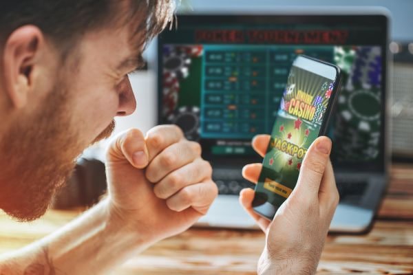 Buku Mimpi calendar interface showing Liga 1 fixtures